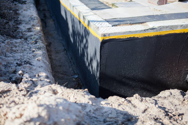 Professional Basement Waterproofing technician working in Monkton, MD